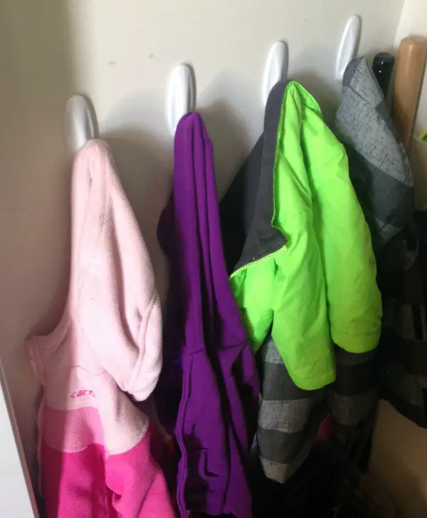How to organize a small entry closet. Maximize the space in your coat closet with these tips to organize coats, shoes, and accessories. | Cents and Order
